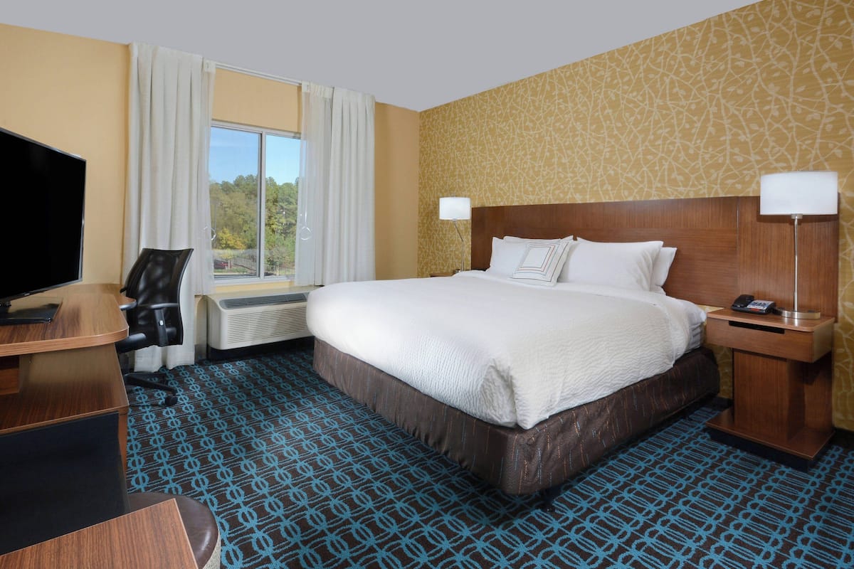 Pillowtop beds, desk, laptop workspace, blackout drapes