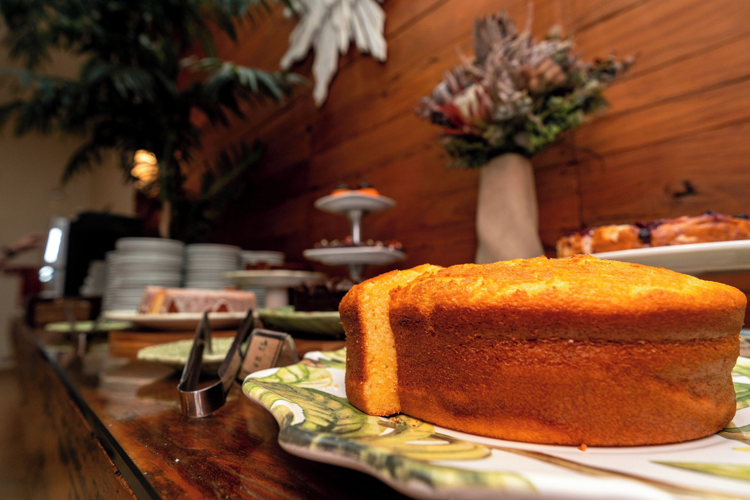 A cake on a plate with a decorative background.