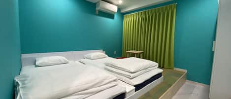 Økonomirom, 2 soverom | Safe på rommet, blendingsgardiner, wi-fi (inkludert) og sengetøy