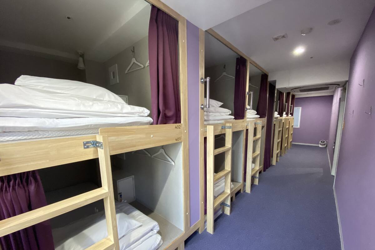 Dormitório compartilhado, em dormitório misto (Wide) | Cofres nos quartos, cortinas blackout, Wi-Fi de cortesia, roupa de cama