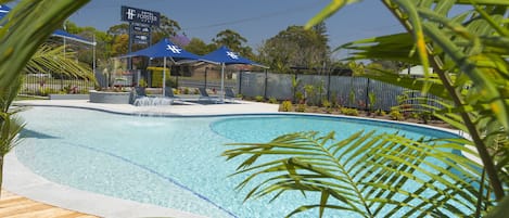 Outdoor pool, pool umbrellas, sun loungers