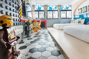 Deluxe Quadruple Room | Bathroom | Shower, rainfall showerhead, hair dryer, slippers - J.T World FunTrip B&B (Hualien City)
