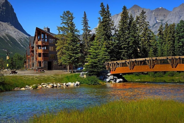 View of Rundle Cliffs Lodge from across the bridge at Policemans Creek
