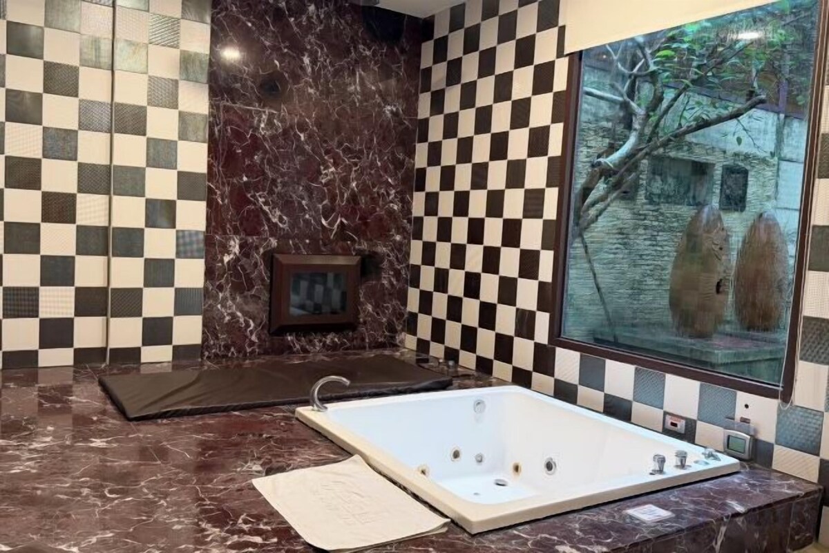 Bathroom | Separate bathtub and shower, rainfall showerhead, free toiletries