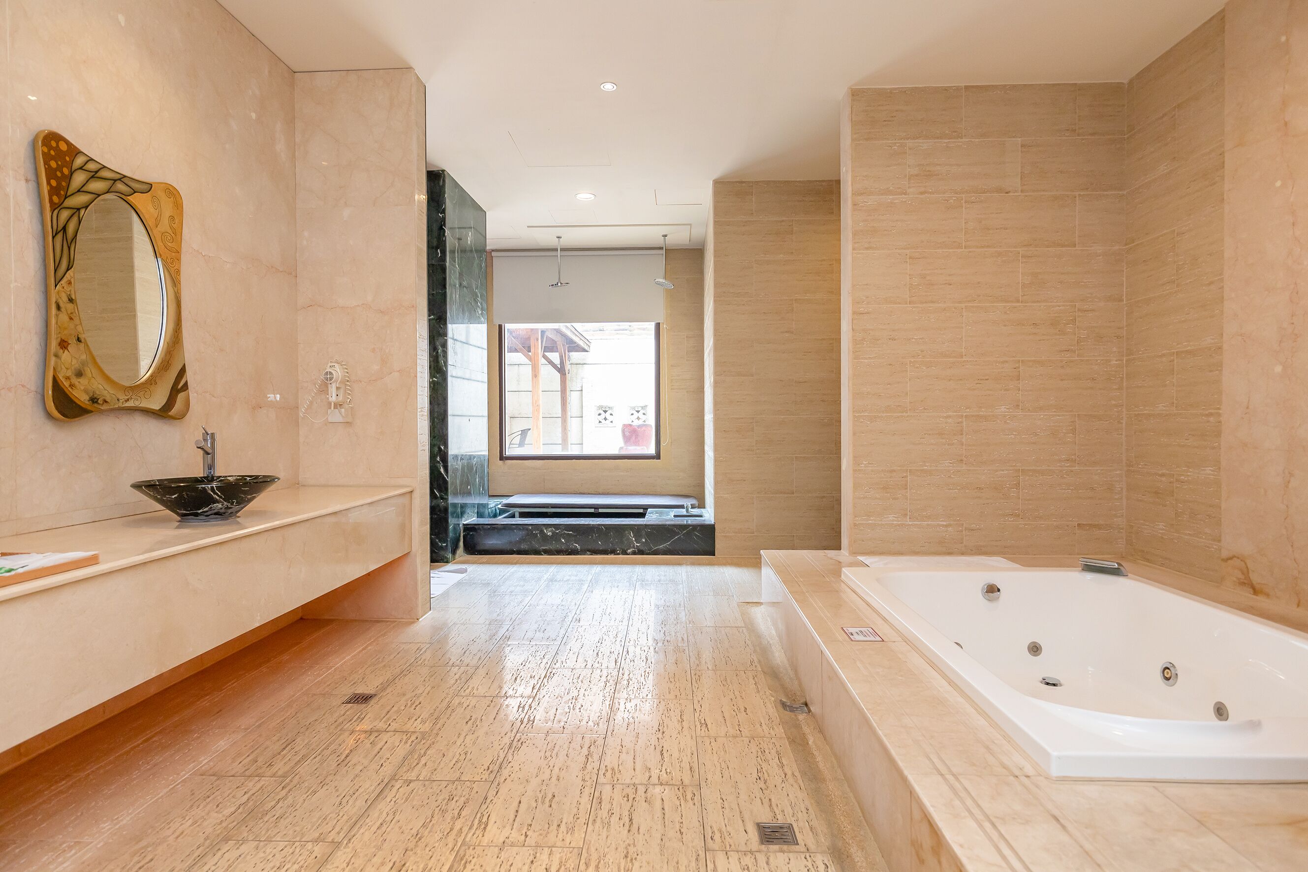 superior double room | bathroom | separate bathtub and shower, rainfall showerhead, free toiletries