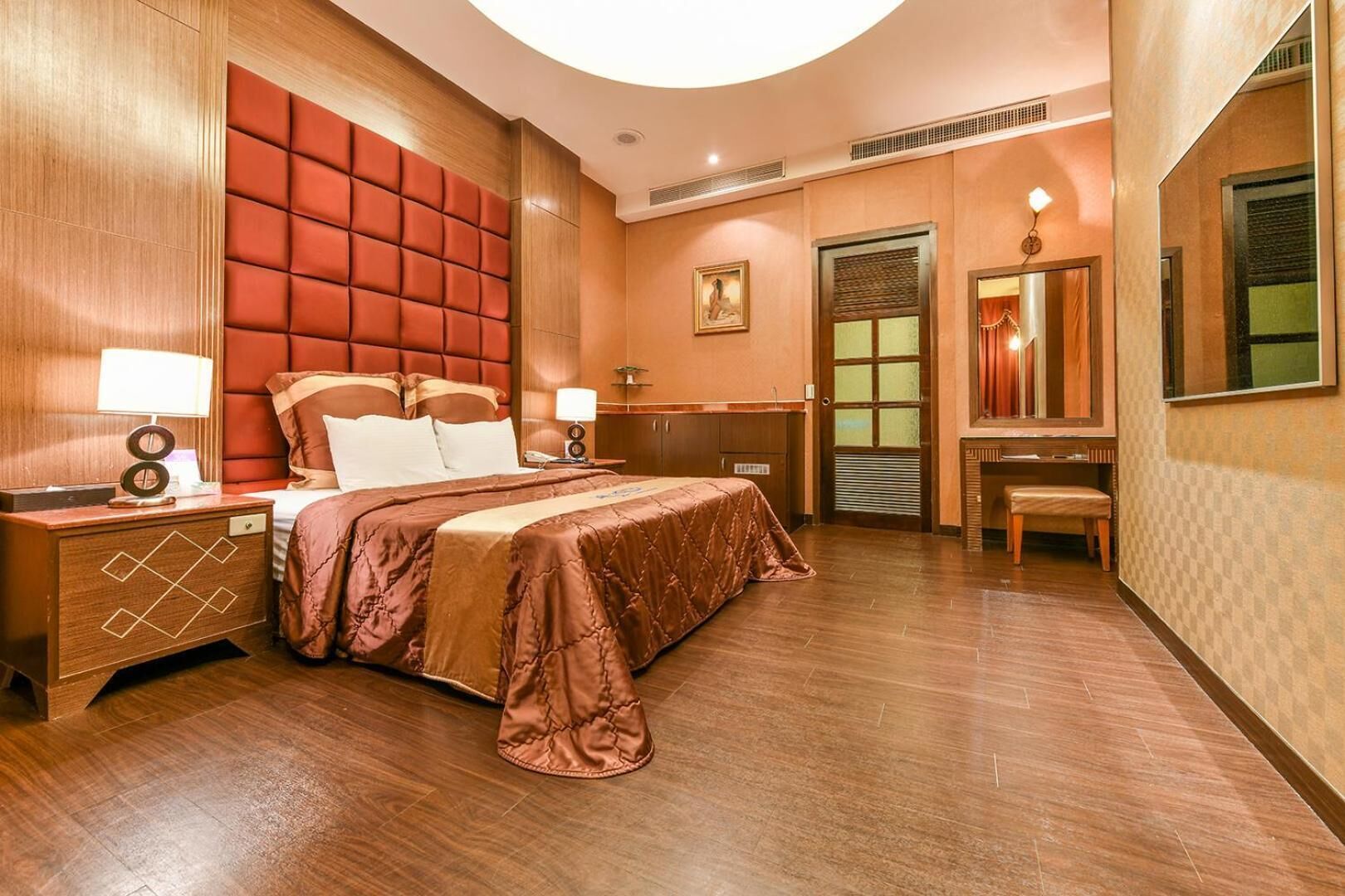 desk, blackout curtains, soundproofing, rollaway beds