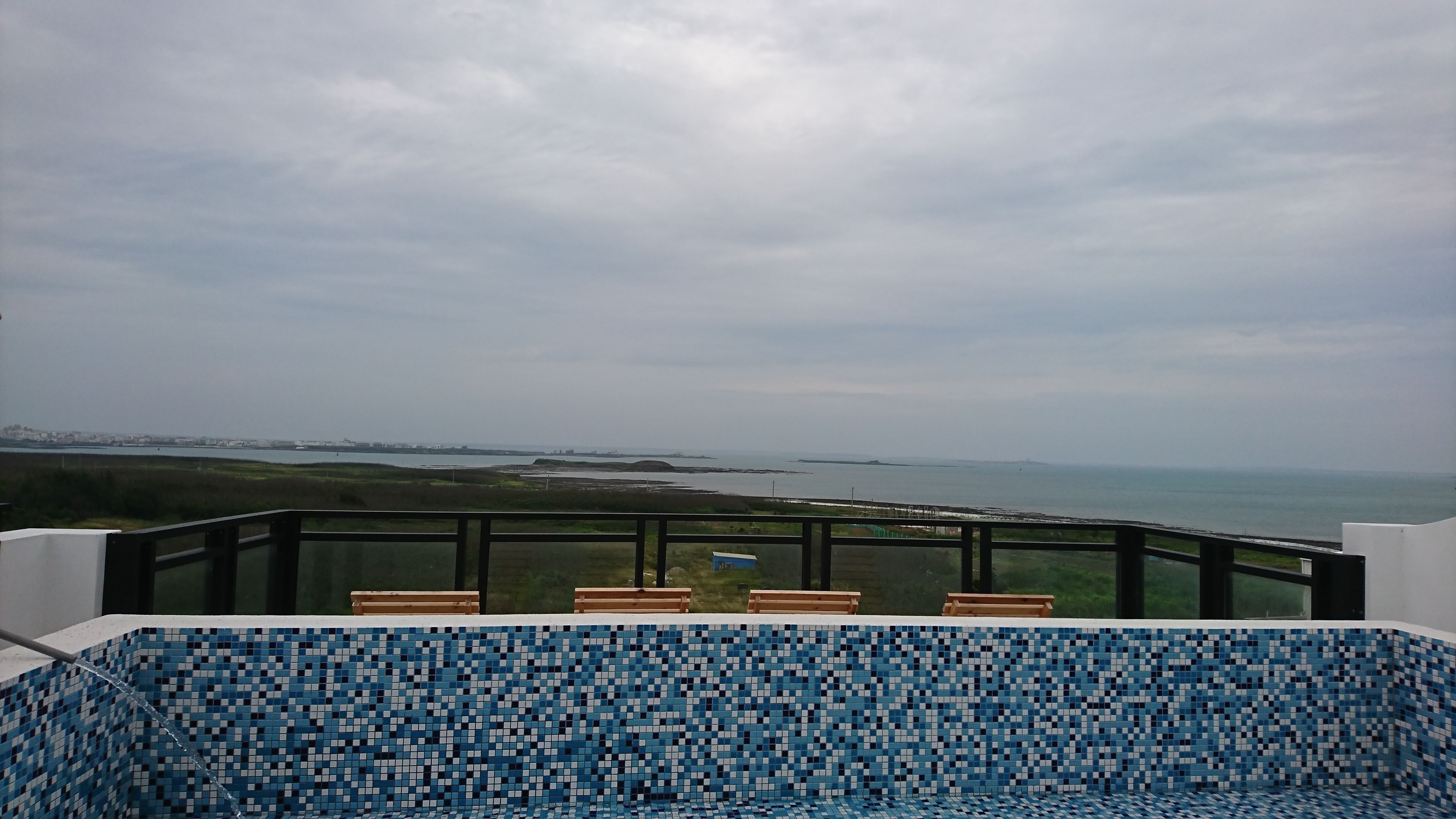 Outdoor pool, a rooftop pool, sun loungers