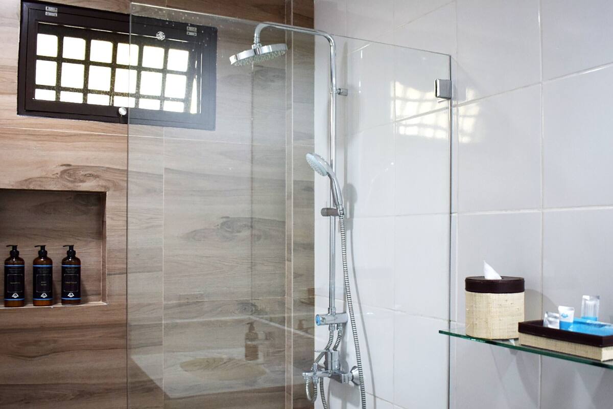 standard room | bathroom | shower, rainfall showerhead, designer toiletries, hair dryer