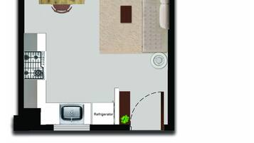 A hotel room layout with a bed, bedside table, chair, and a small kitchenette area including a refrigerator and stove.