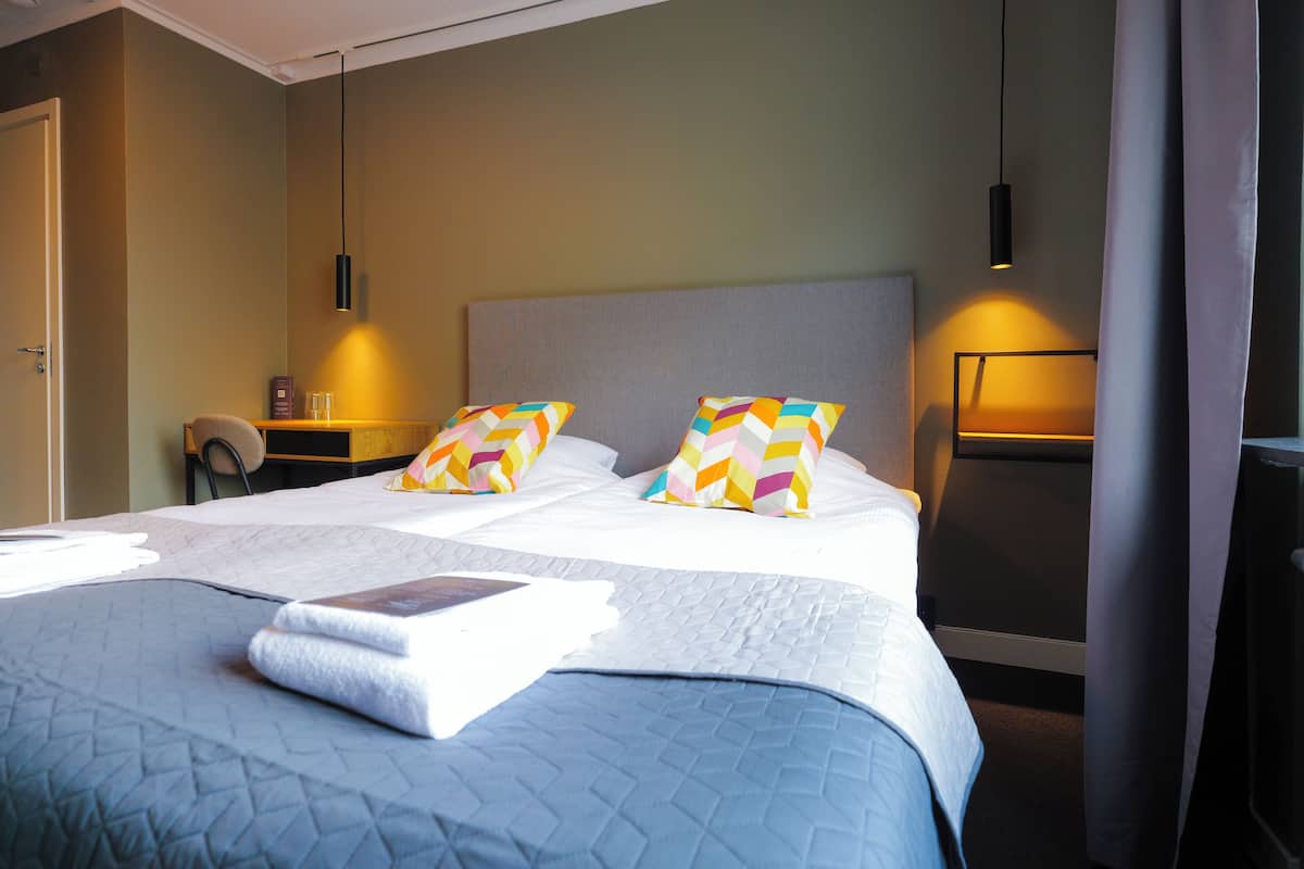 Twin Room (With shared shower) | Desk, iron/ironing board, free WiFi, bed sheets