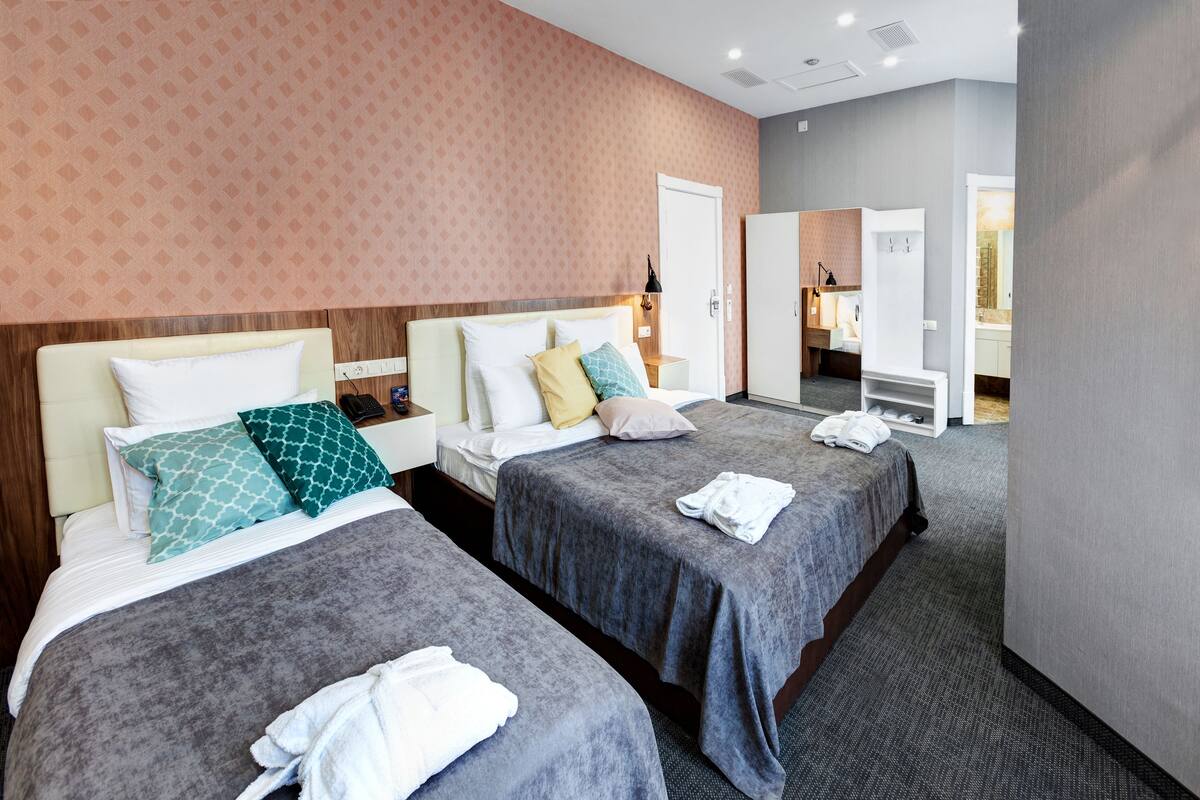 Superior Triple Room | Minibar, in-room safe, desk, soundproofing