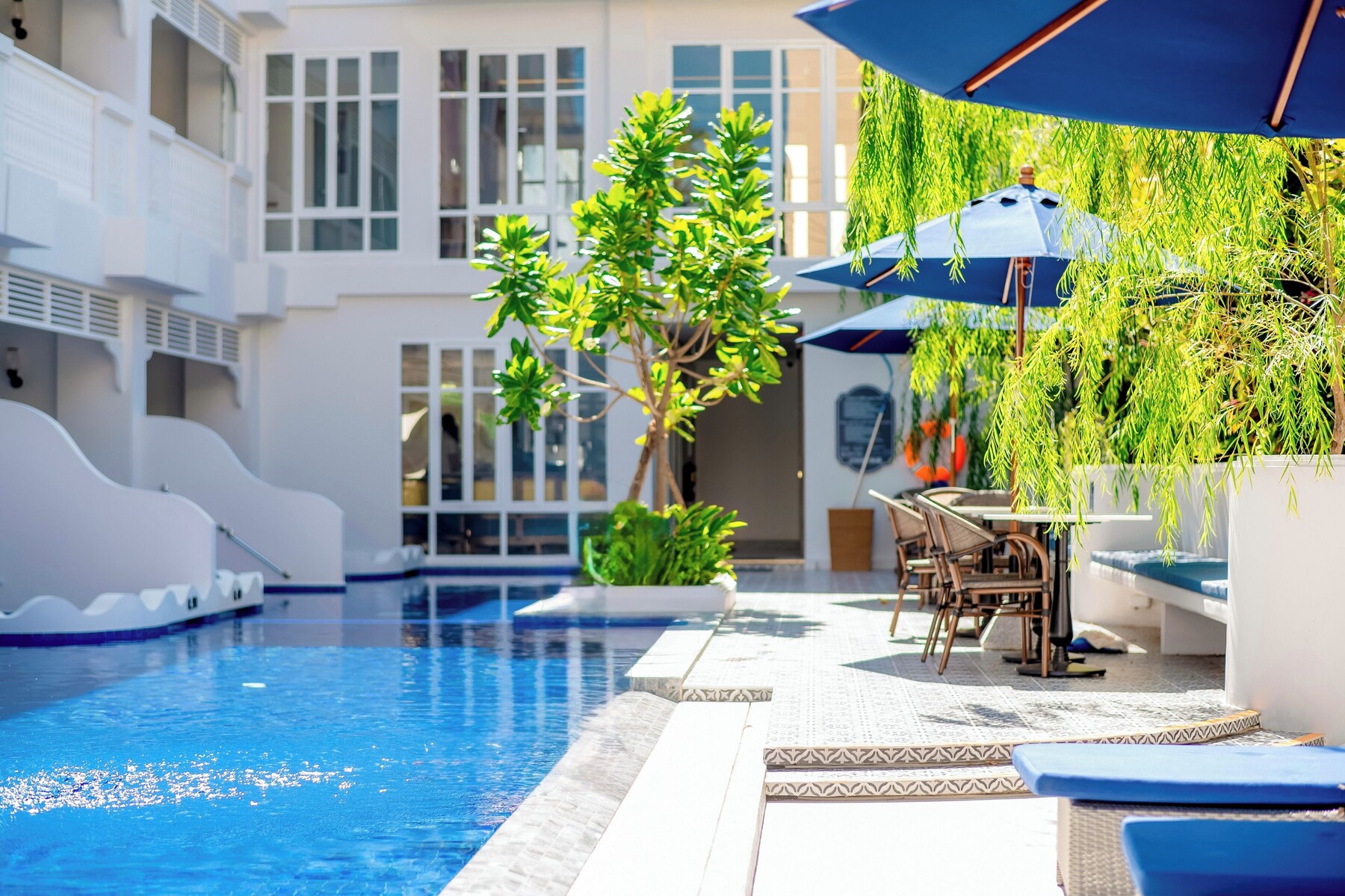 2 outdoor pools, pool umbrellas, pool loungers