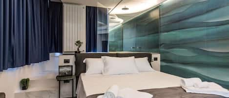 Suite, Jetted Tub, City View | Frette Italian sheets, premium bedding, in-room safe