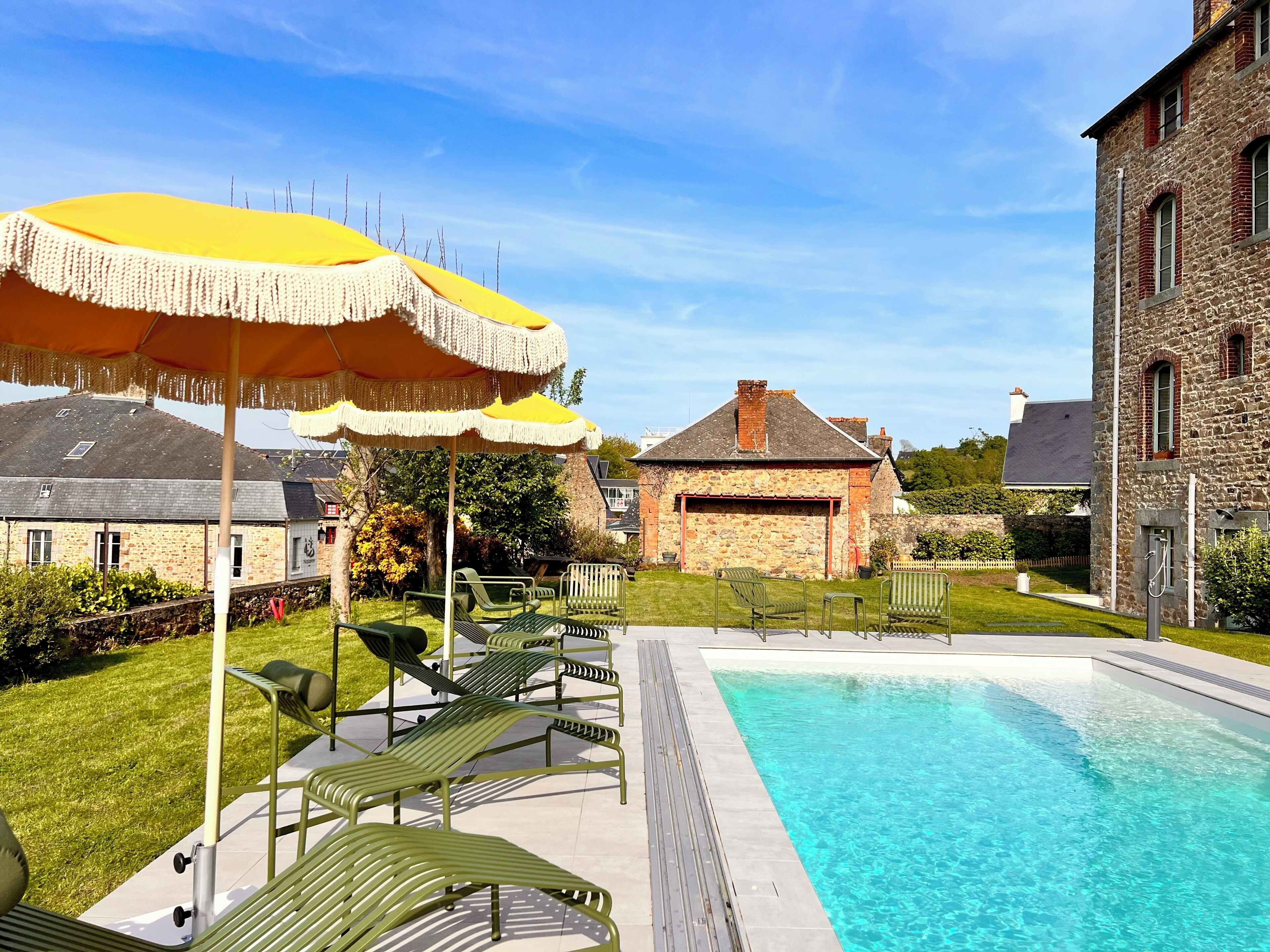 Indoor pool, seasonal outdoor pool, pool umbrellas, pool loungers