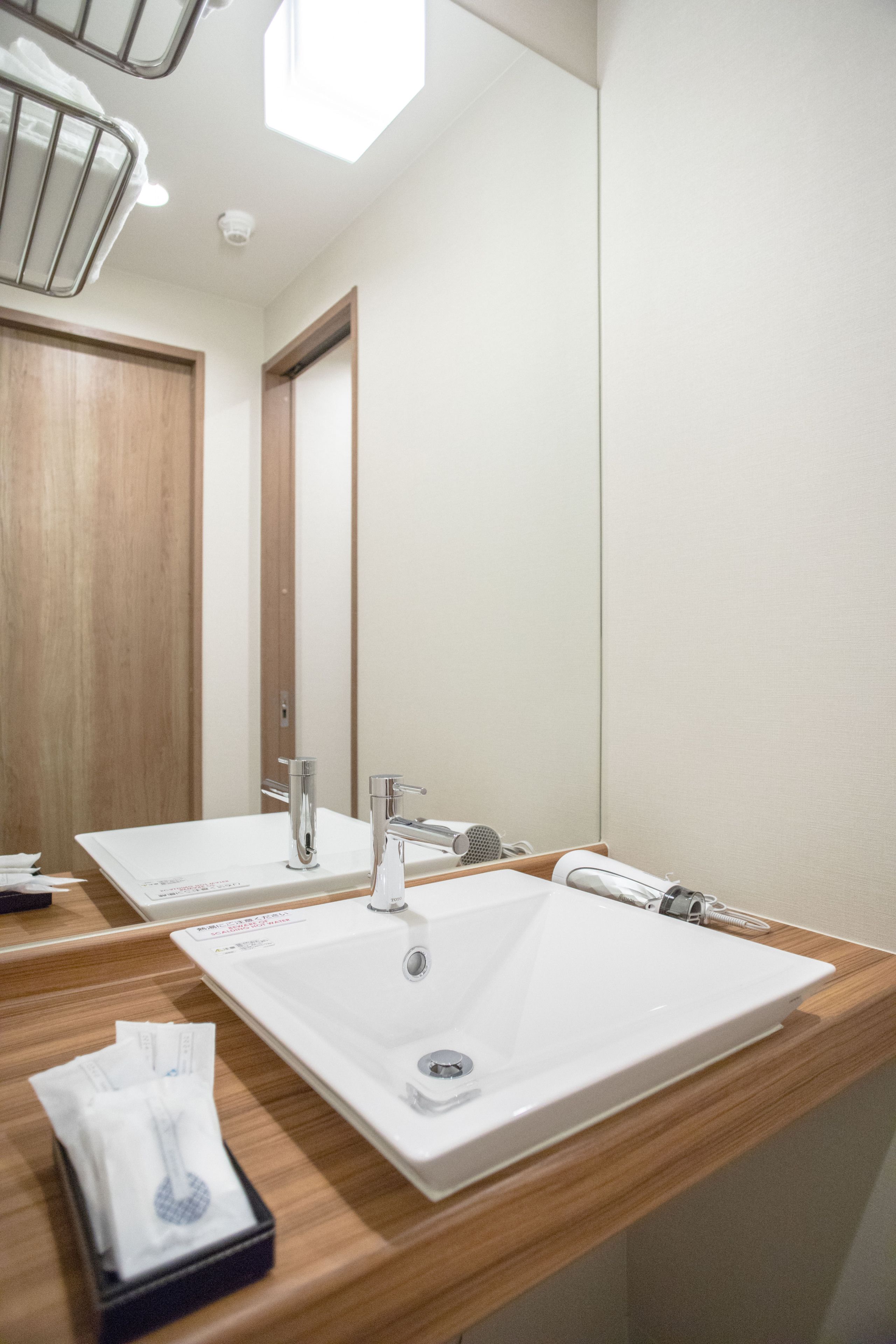 separate bathtub and shower, free toiletries, hair dryer, slippers