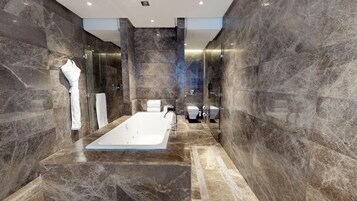 Royal Suite, 1 King Bed | Bathroom | Deep soaking tub, free toiletries, hair dryer, bathrobes