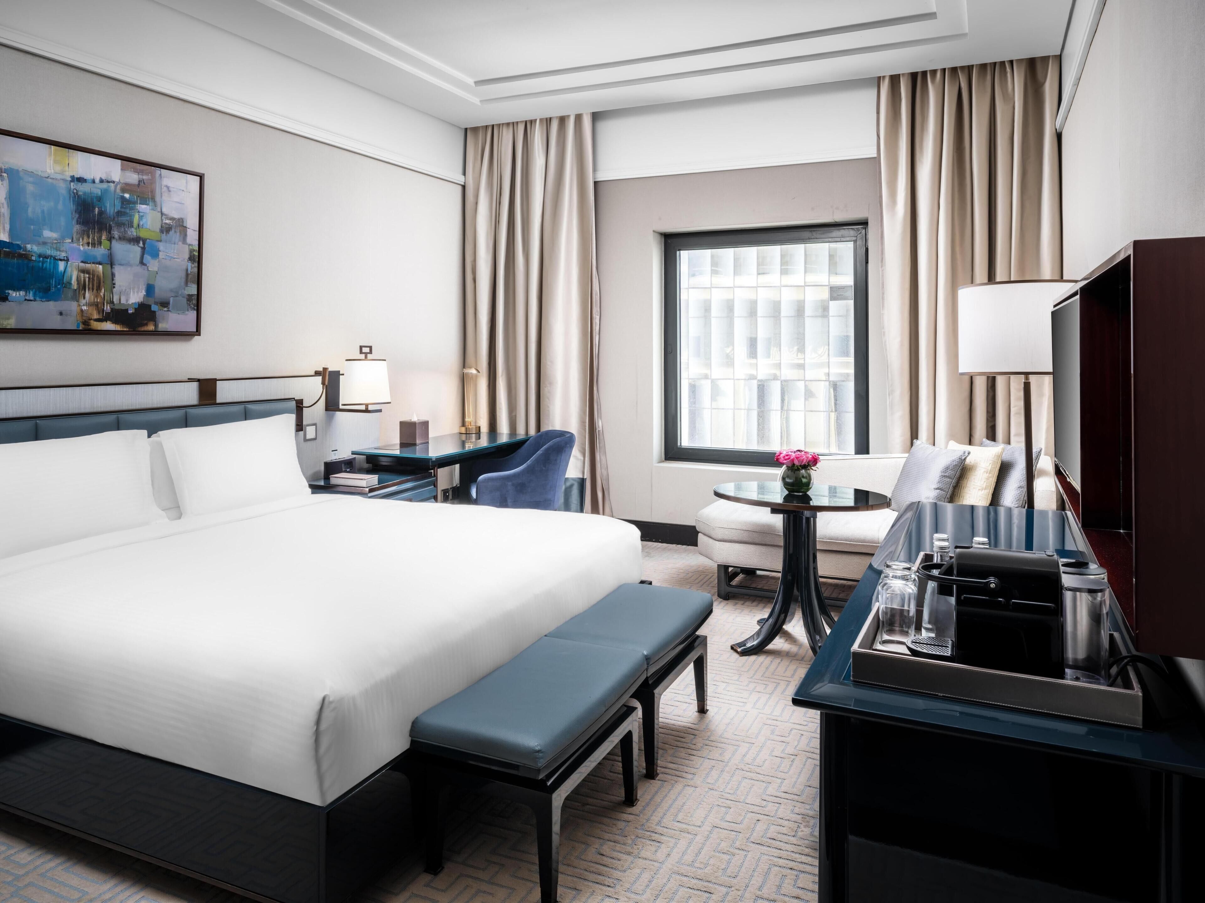 Premium bedding, pillow-top beds, minibar, in-room safe