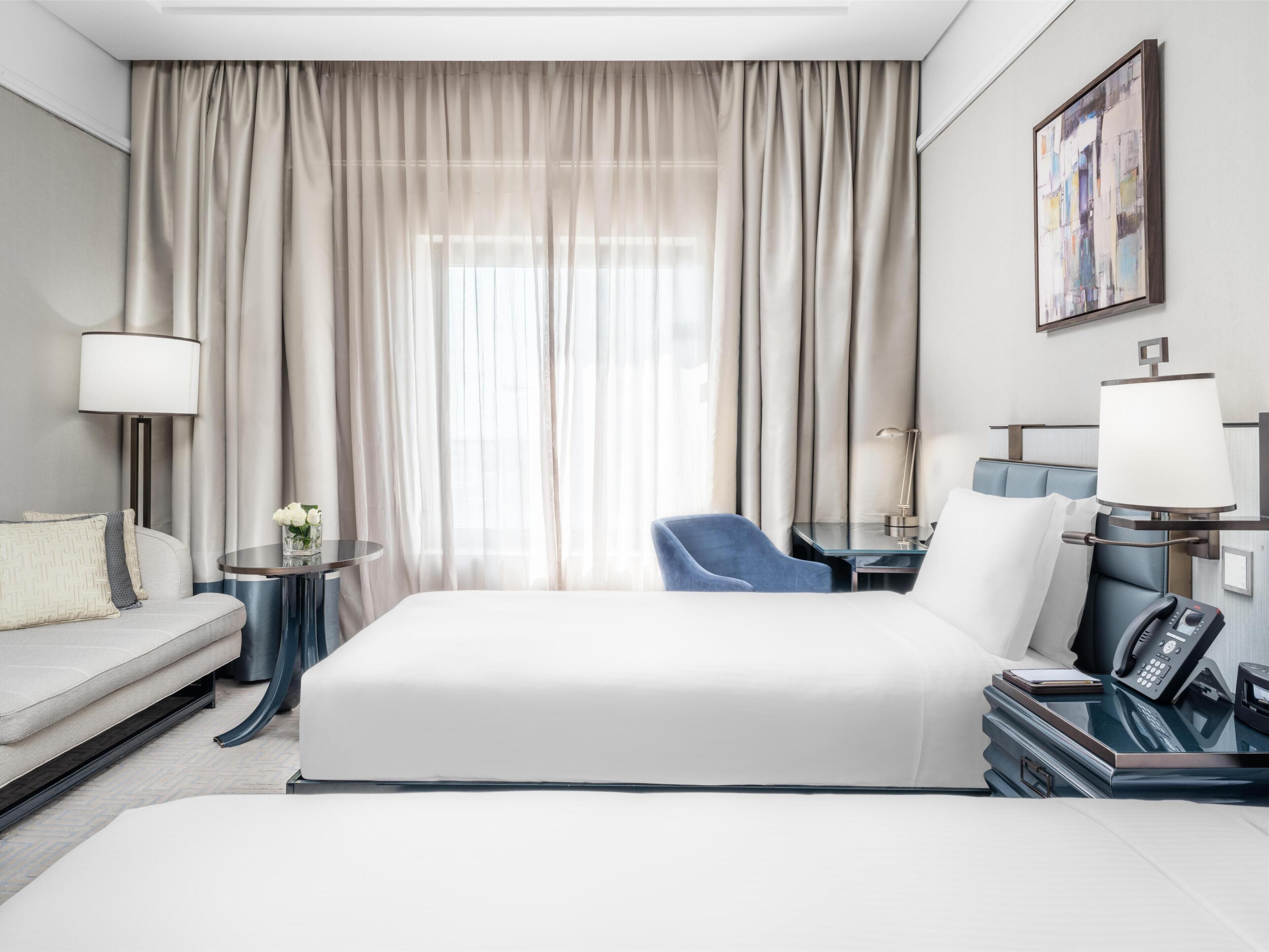 Premium bedding, pillow-top beds, minibar, in-room safe
