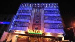 A building with a sign reading "DATYIK" and a staircase leading to the entrance. - Dr. Rajkumar International Hotel (Bengaluru)