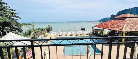 Outdoor pool, pool umbrellas, sun loungers