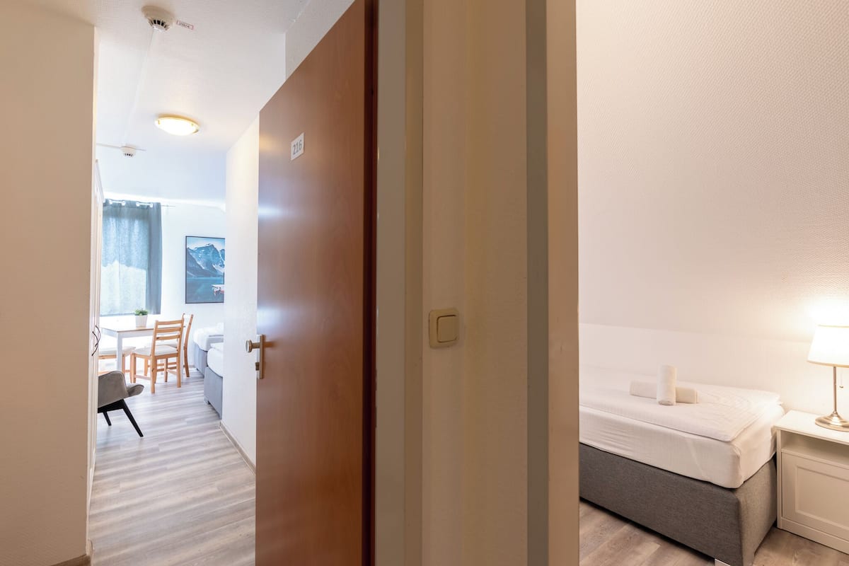 family room, multiple beds | desk, laptop workspace, free wifi, bed sheets