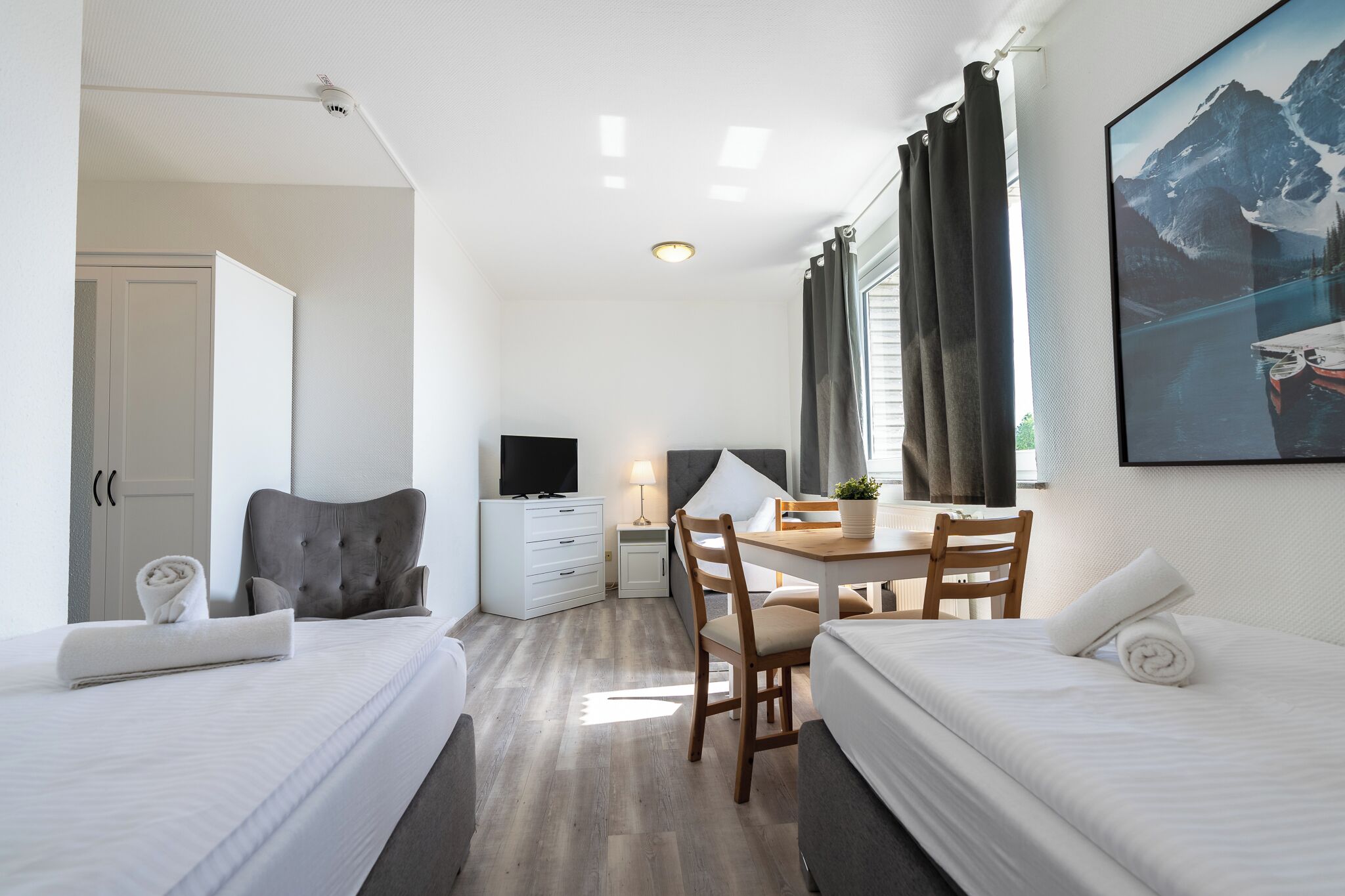 family room, multiple beds | desk, laptop workspace, free wifi, bed sheets