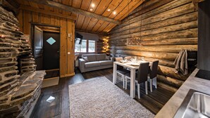 Deluxe Apartment, 1 Bedroom, Garden Area | Living area | Smart TV, fireplace, video-game console, DVD player - UnelmaPovi (Kuusamo)