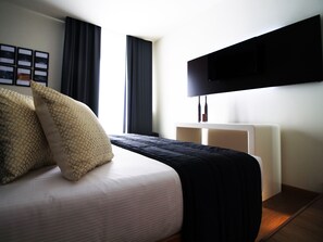 Ropa de cama de alta calidad y minibar con artículos gratuitos