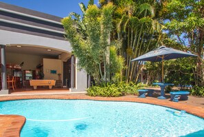 Outdoor pool, pool umbrellas, sun loungers