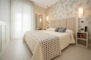 Double or Twin Room, Balcony | In-room safe, individually decorated, individually furnished, desk