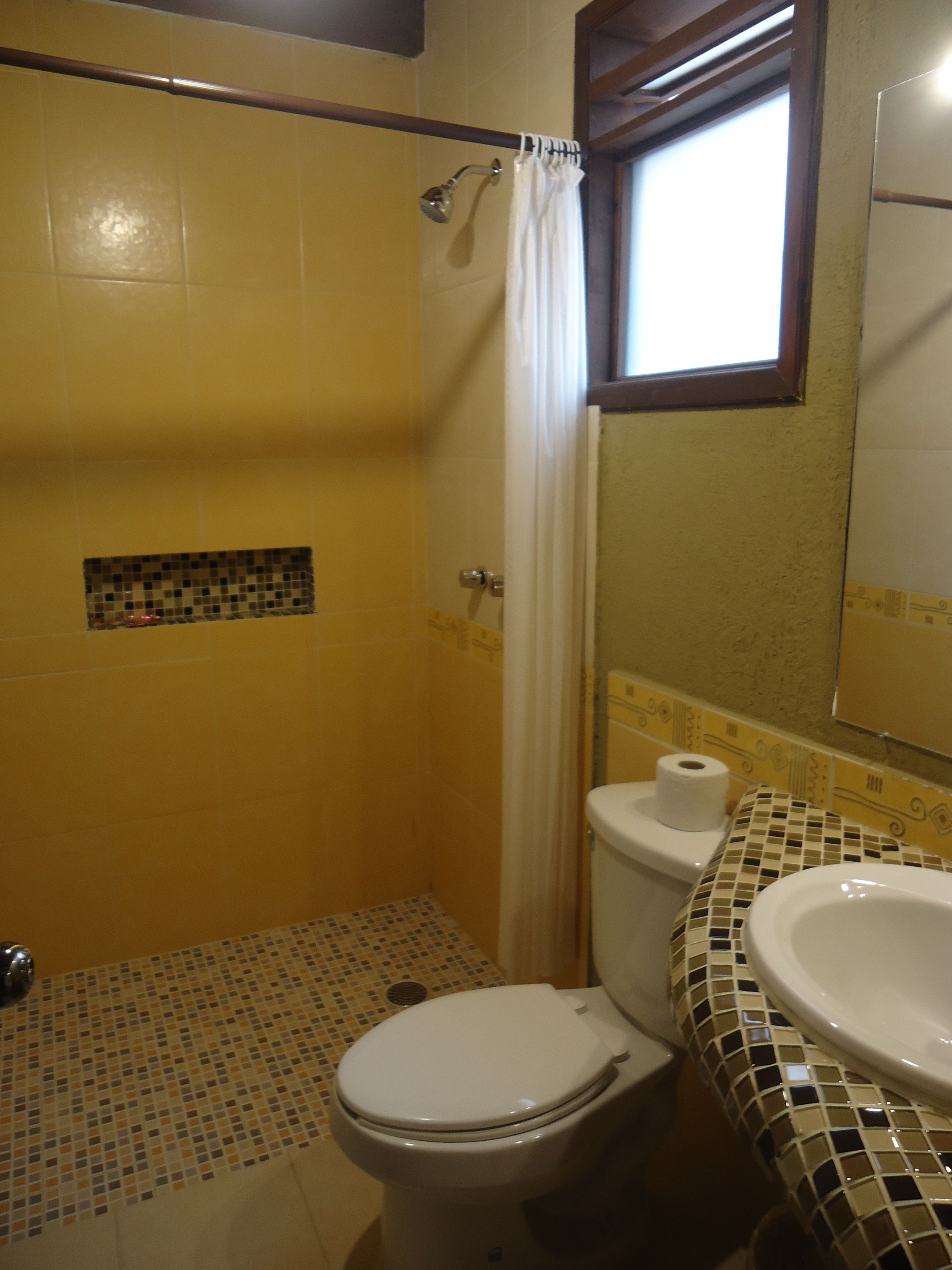 quadruple room, 2 double beds | bathroom | shower, free toiletries, hair dryer, towels