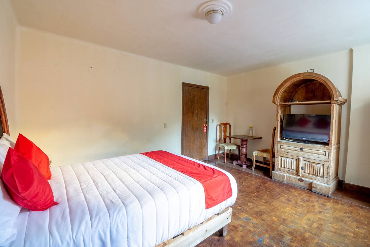 Quarto standard | Escrivaninha, Wi-Fi de cortesia, roupa de cama