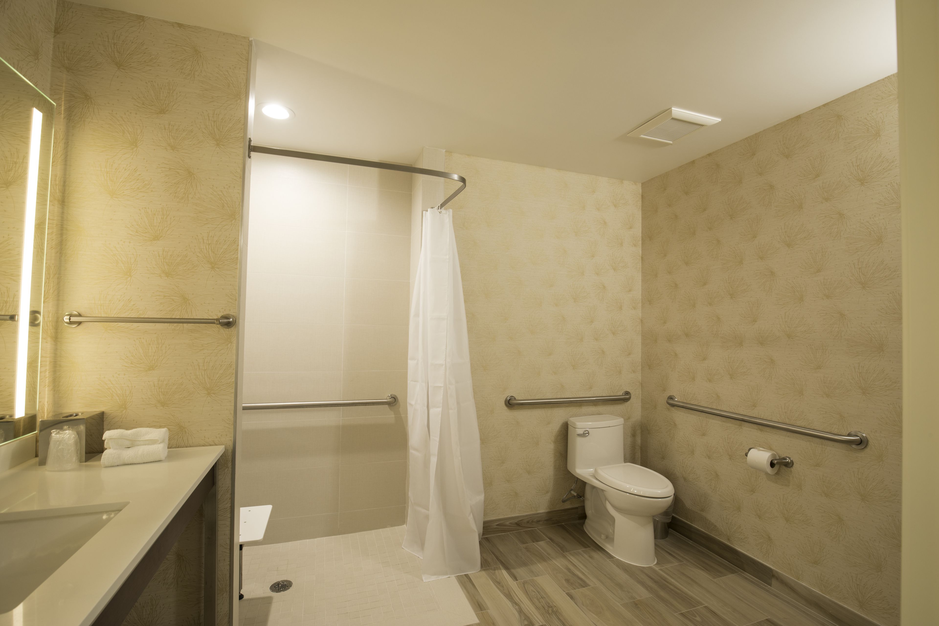 Designer toiletries, hair dryer, towels