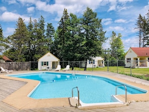 Seasonal outdoor pool, open 10:30 AM to 8:30 PM, pool loungers