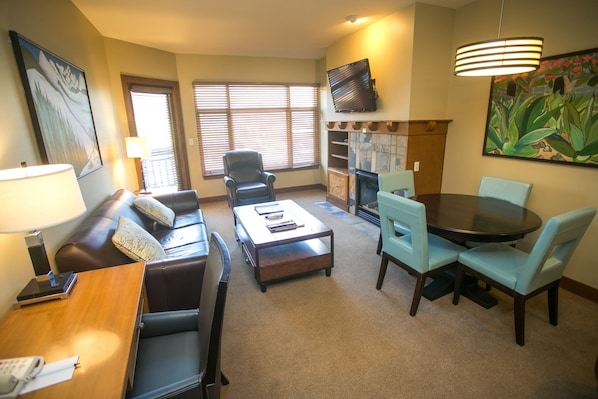 Condo, 1 Bedroom | Living room | Flat-screen TV