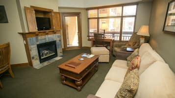 Condo, 1 Bedroom | Living room | Flat-screen TV, fireplace, DVD player