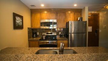 Condo, 1 Bedroom | Private kitchen | Full-size fridge, microwave, oven, stovetop