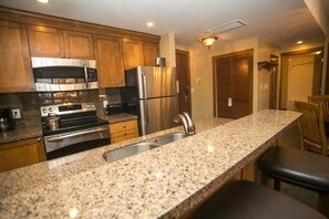 Condo, 1 Bedroom | Private kitchen | Full-sized fridge, microwave, oven, stovetop - Sundial Lodge Condo Steps from Red Pine Gondola by RedAwning (Park City)