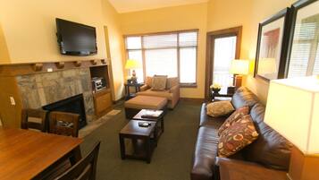 Condo, 2 Bedrooms | Living area | TV, fireplace