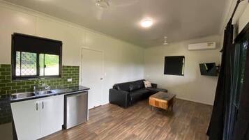 Family Cabin | Living area | Flat-screen TV
