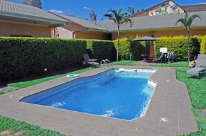 Outdoor pool, pool umbrellas, pool loungers