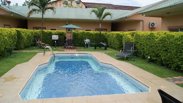 Outdoor pool, pool umbrellas, pool loungers