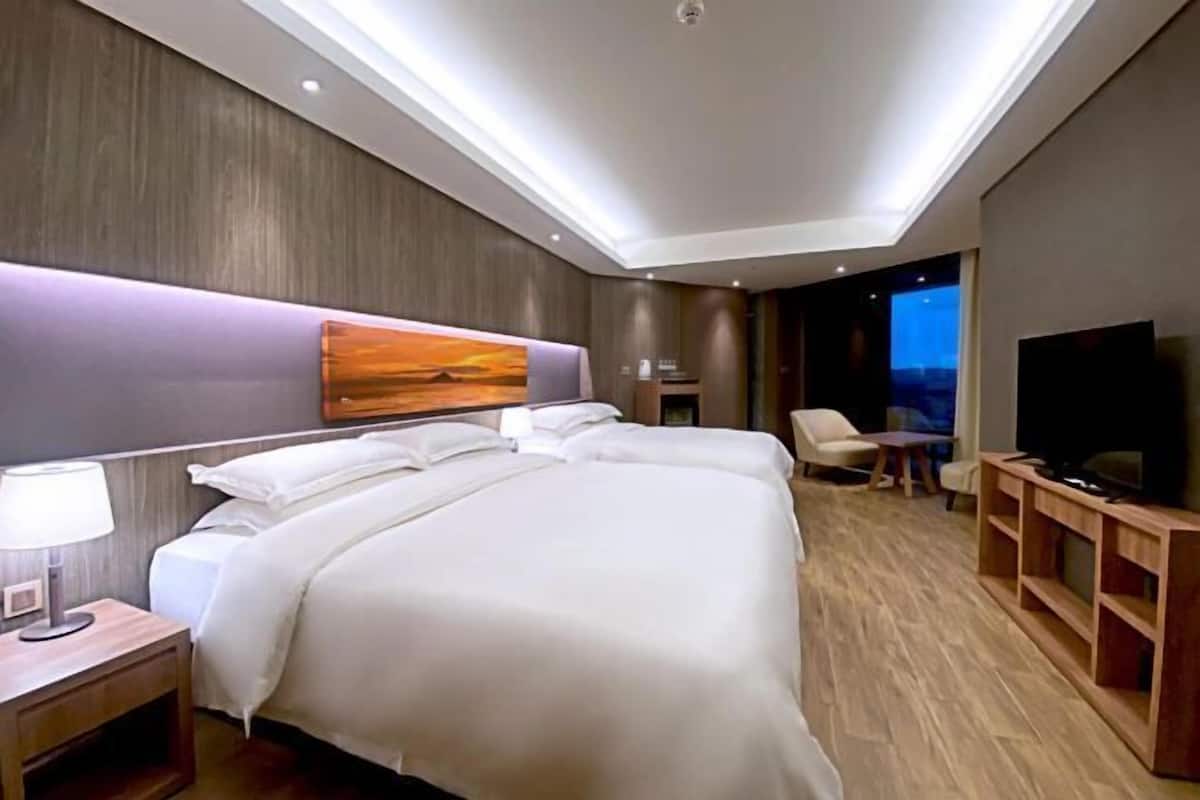 Ropa de cama de alta calidad, cubrecamas y minibar