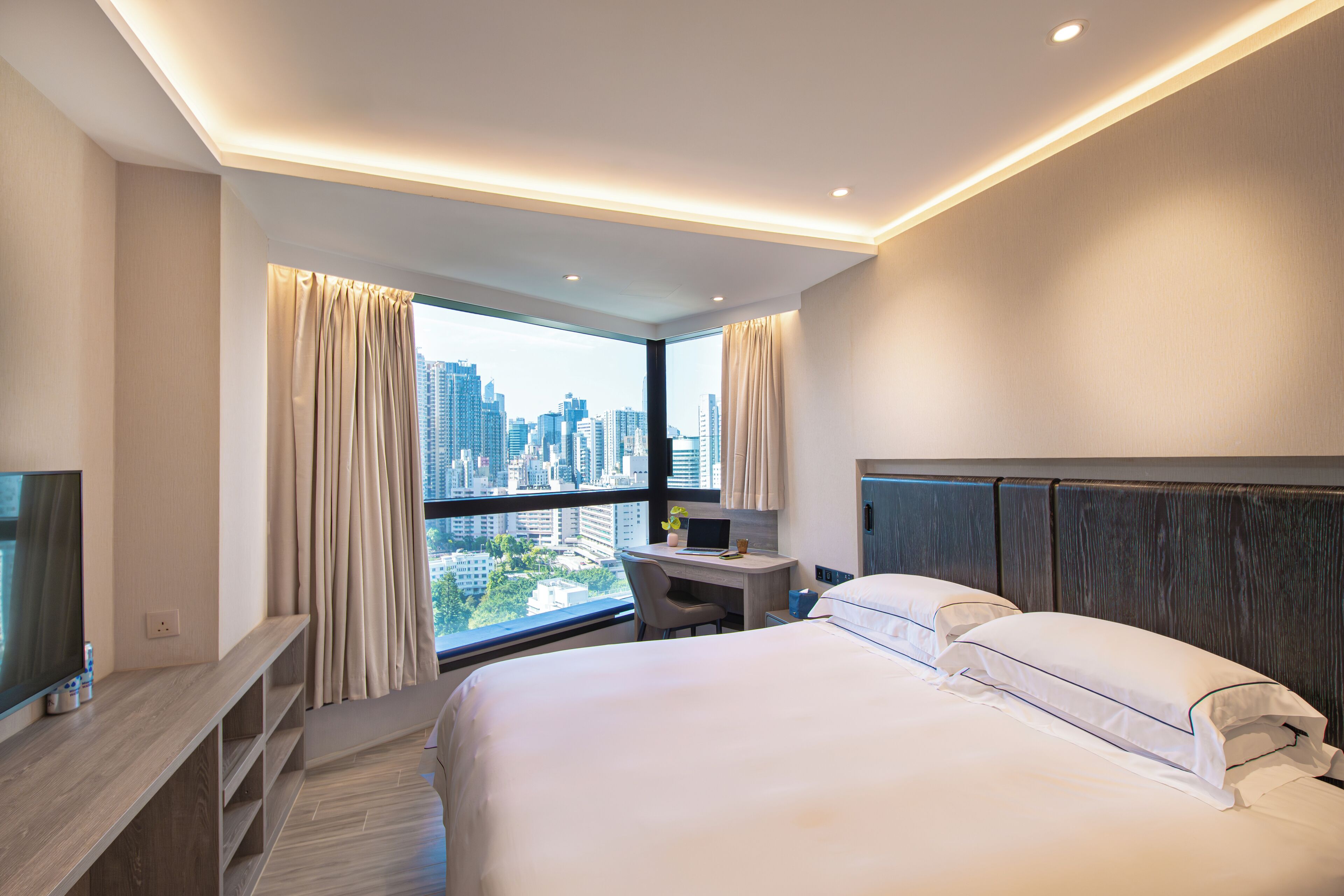 Deluxe Plus Room | In-room safe, desk, blackout drapes, iron/ironing board
