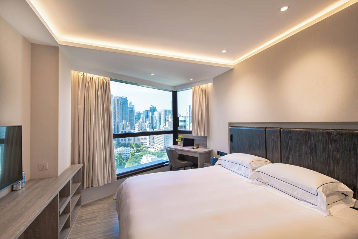 Deluxe Plus Room | In-room safe, desk, blackout drapes, iron/ironing board (on request)