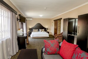Quarto executivo | Roupas de cama premium, frigobar, cofres nos quartos, escrivaninha