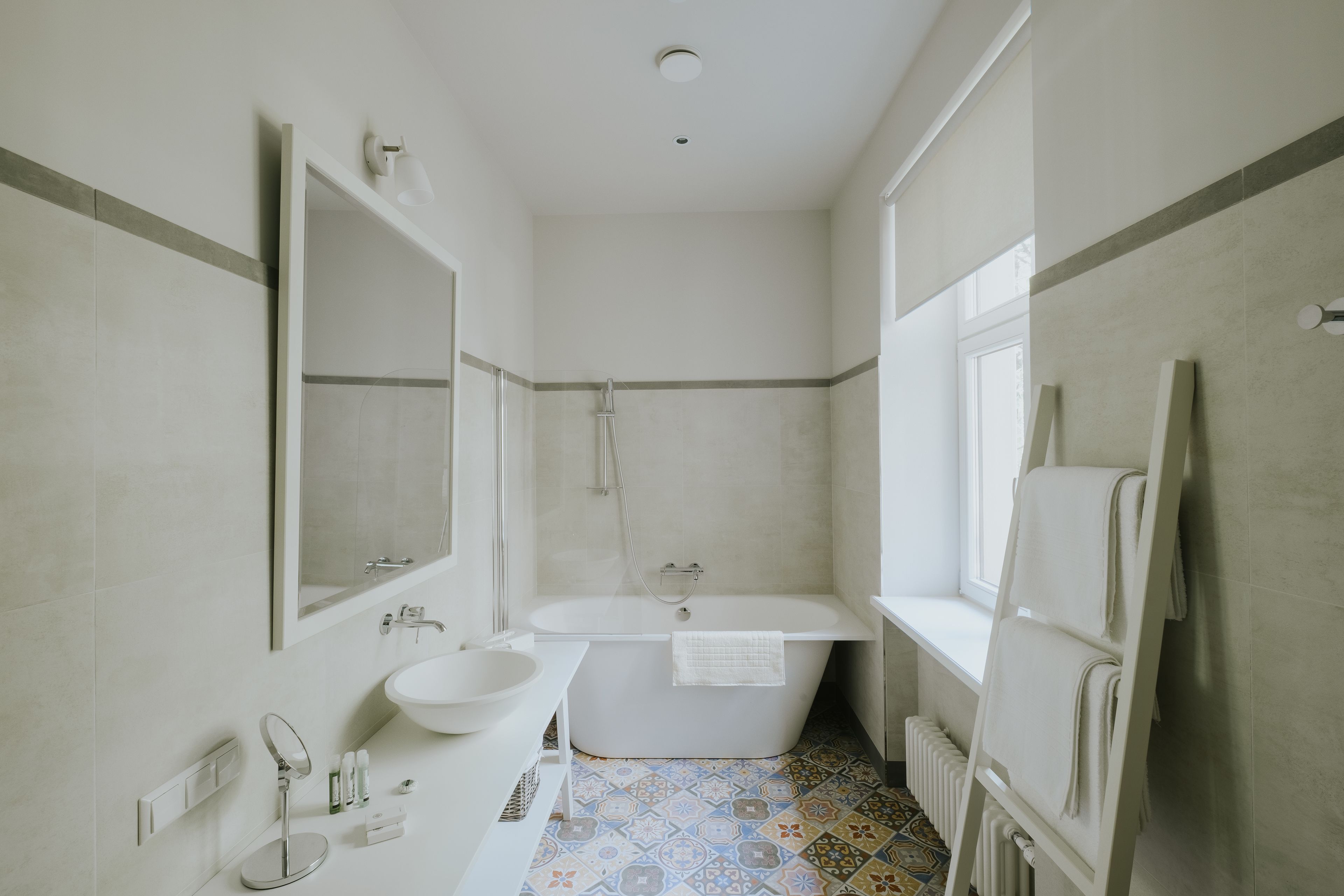 superior deluxe room | bathroom | shower, free toiletries, hair dryer, slippers