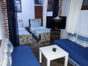 Quadruple Room | Minibar, individually decorated, blackout curtains, free WiFi