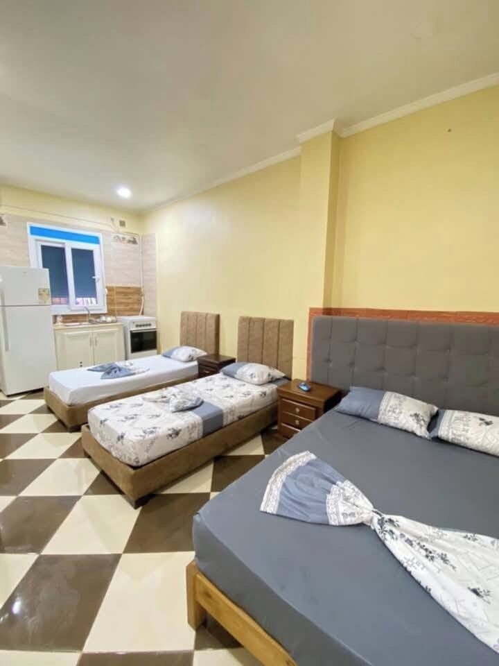 Ropa de cama de alta calidad y tabla de planchar con plancha 
