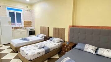 Ropa de cama de alta calidad y tabla de planchar con plancha